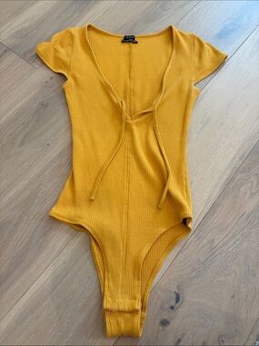 Out From Under by Urban Outfitters Ribbed Mustard Tie-Front Cap Sleeve Bodysuit